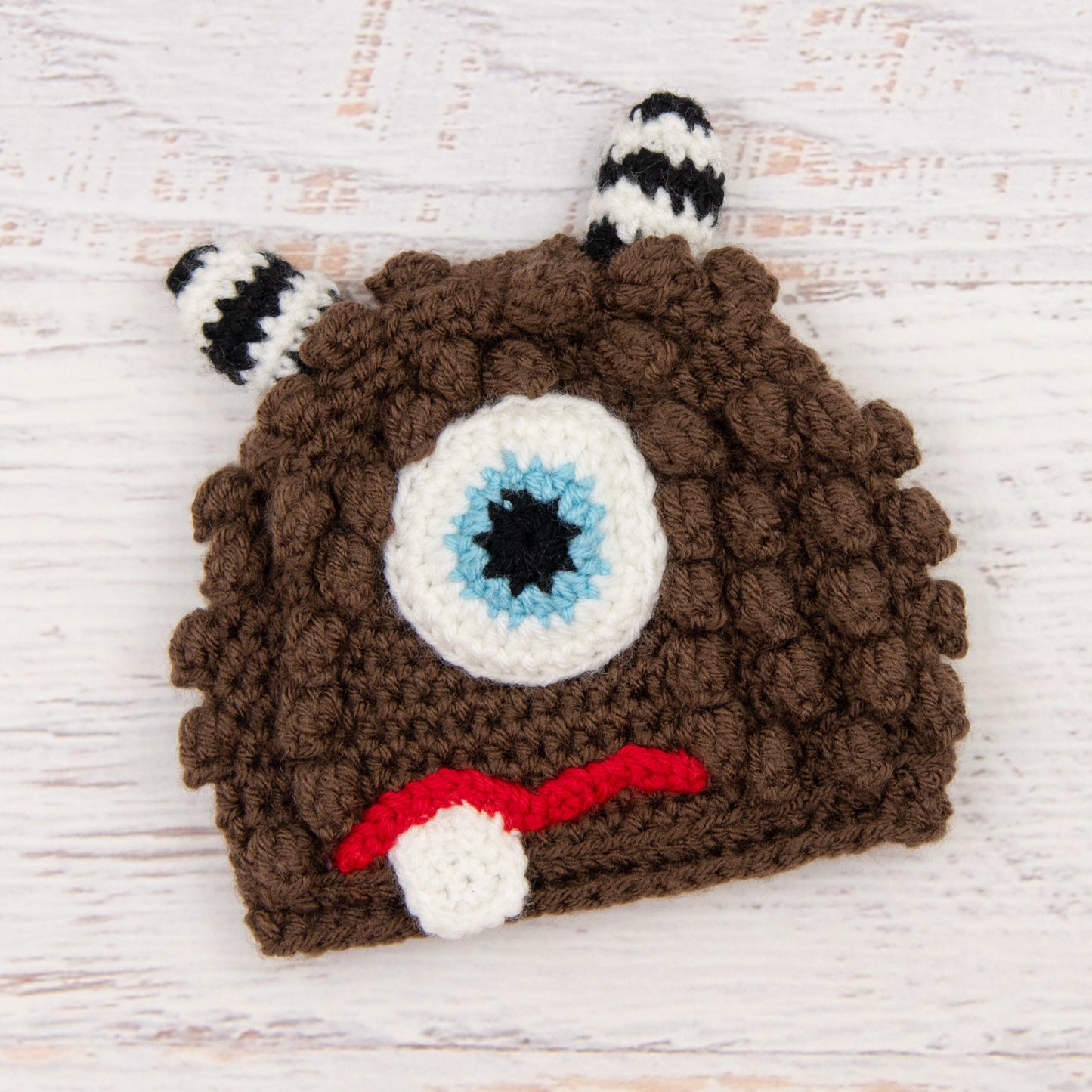 In-Stock 6-12 Month Little Monster in Chocolate with Baby Aqua Eye.
