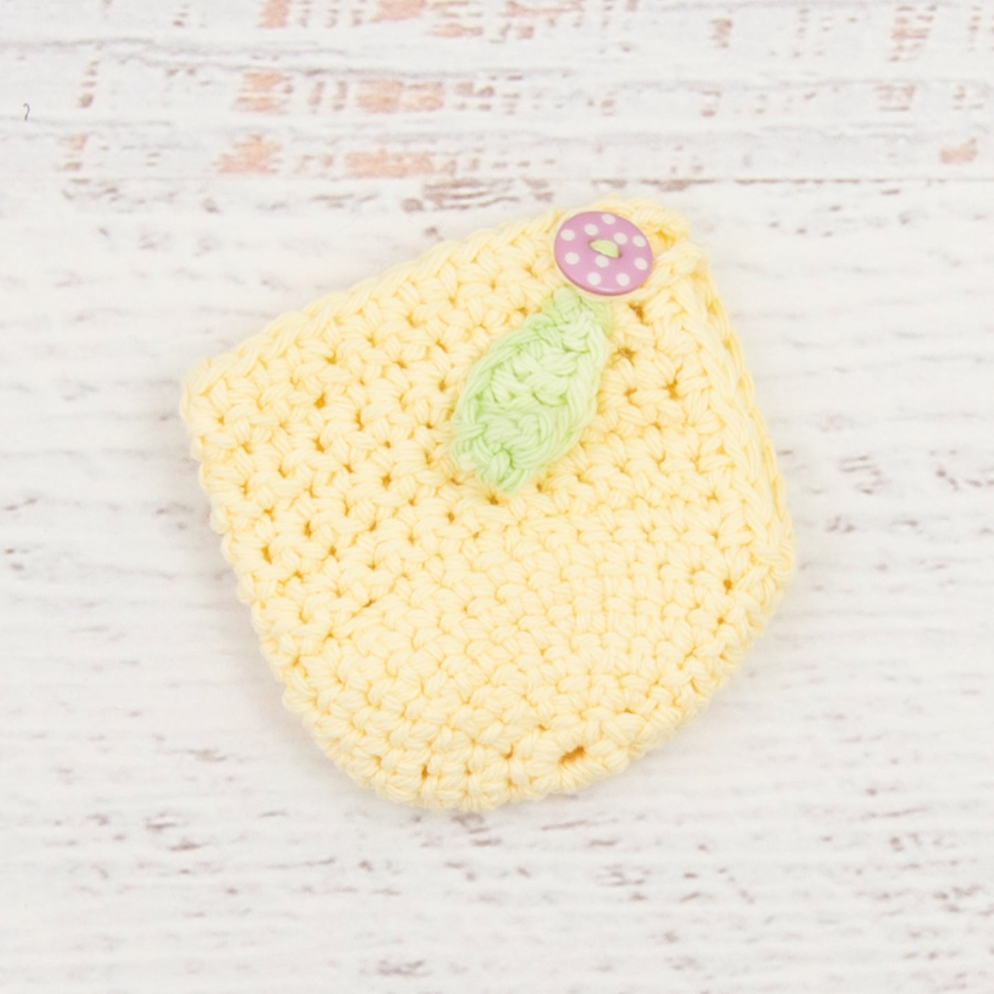Cotton Apple Cozy in Pale Yellow with Pink Button Detail