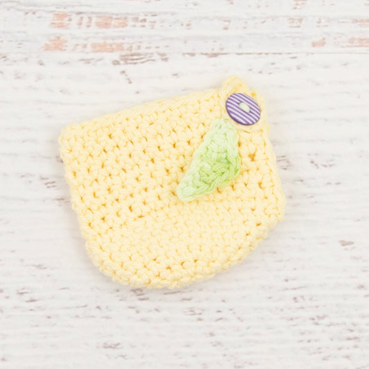 Cotton Apple Cozy in Pale Yellow with Purple Button Detail