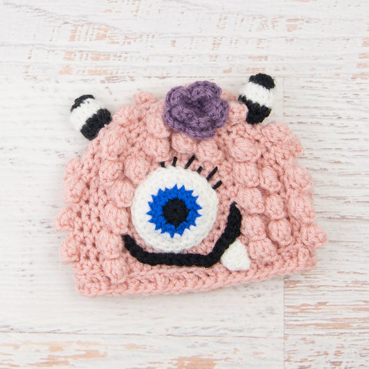 In-Stock 6-12 Month Little Monster in Pink with Electric Blue Eye and Dusty Purple Flower