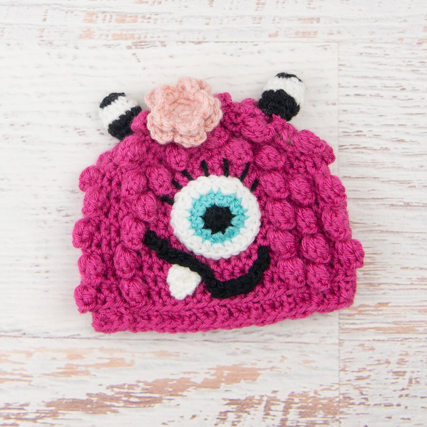 In-Stock 6-12 Month Little Monster in Raspberry with Aqua Marine Eye and Pink Flower